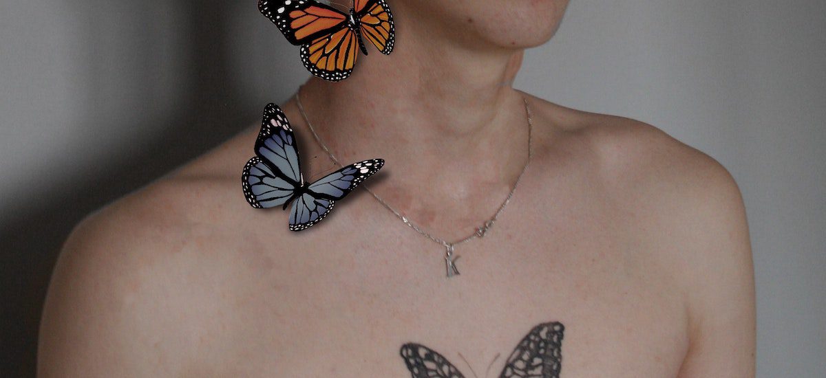 Collarbone 3d butterfly neck tattoo